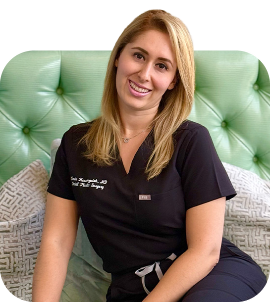 Dr. Tania Hassanzadeh seated in her practice